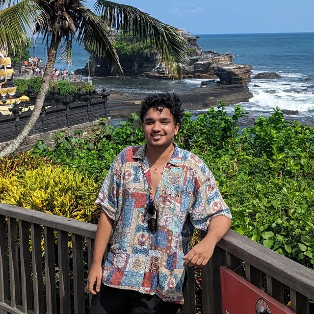 Shubham Agarwal standing by the sea